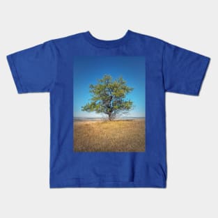 tree on the top of a hill Kids T-Shirt